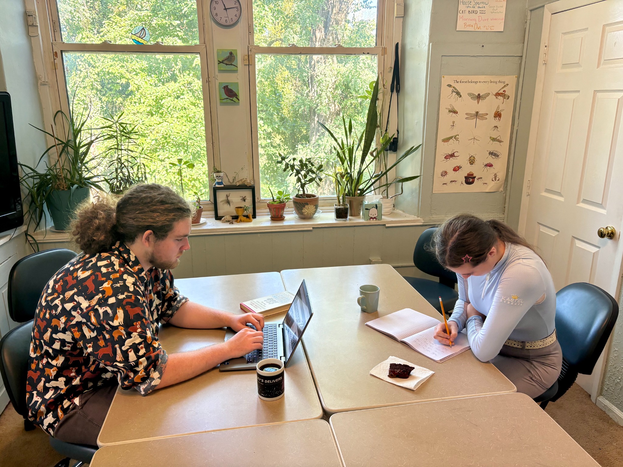 Two Writing Café participants writing at BLC